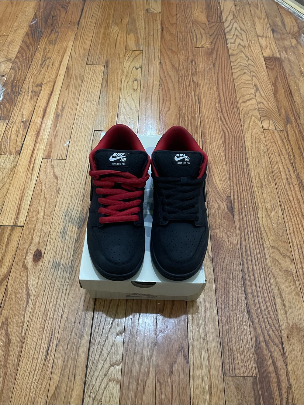 Nike Men’s Black Sneakers with Red Accents